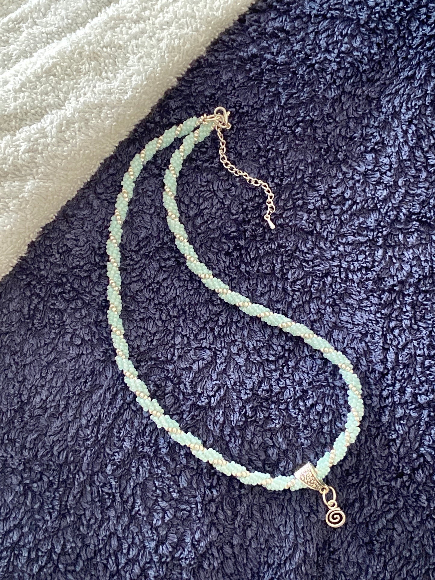 handmade beaded rope necklace with a mini spiral pendant. made by creativefusionsfashion