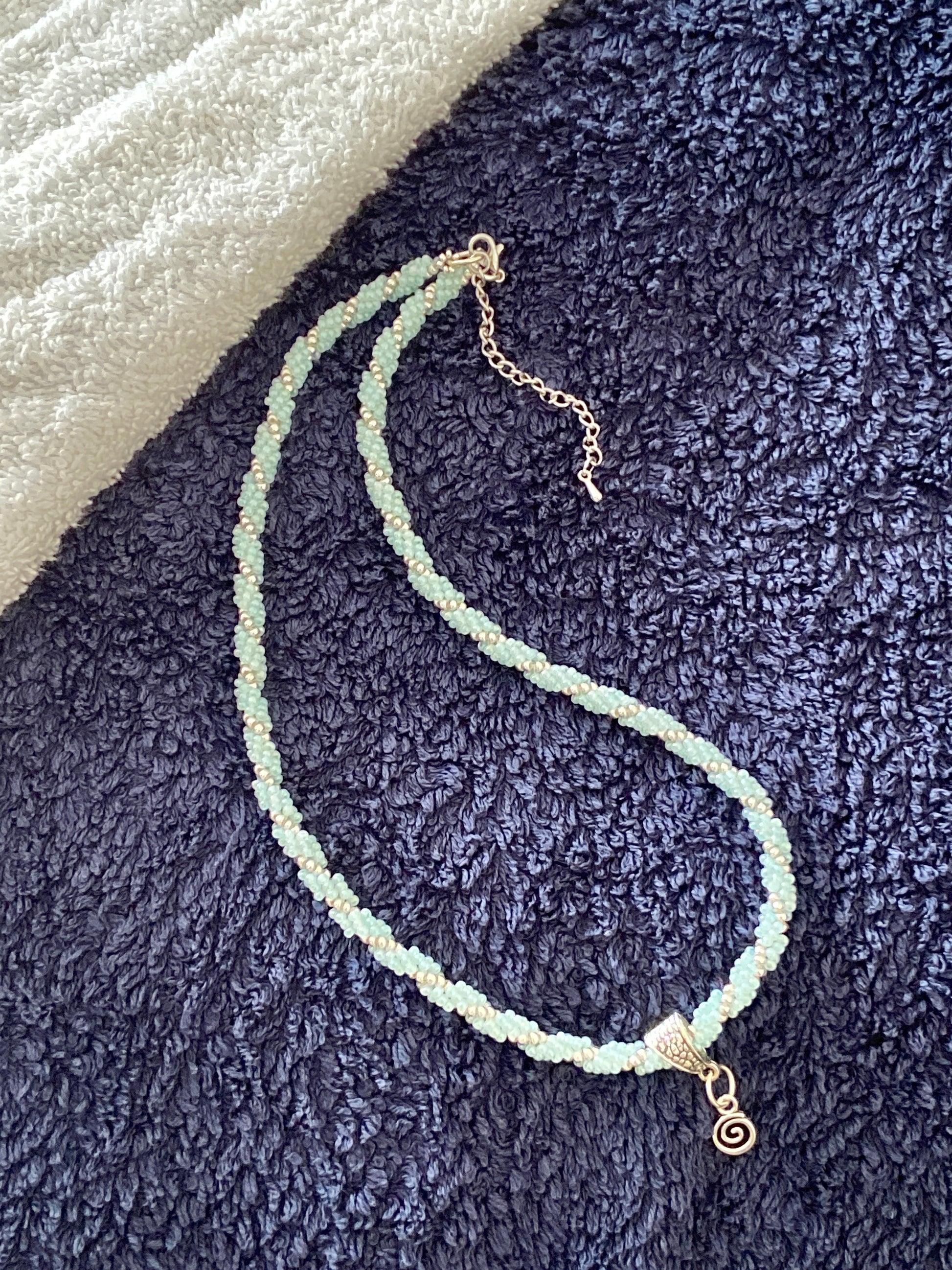 handmade beaded rope necklace with a mini spiral pendant. made by creativefusionsfashion