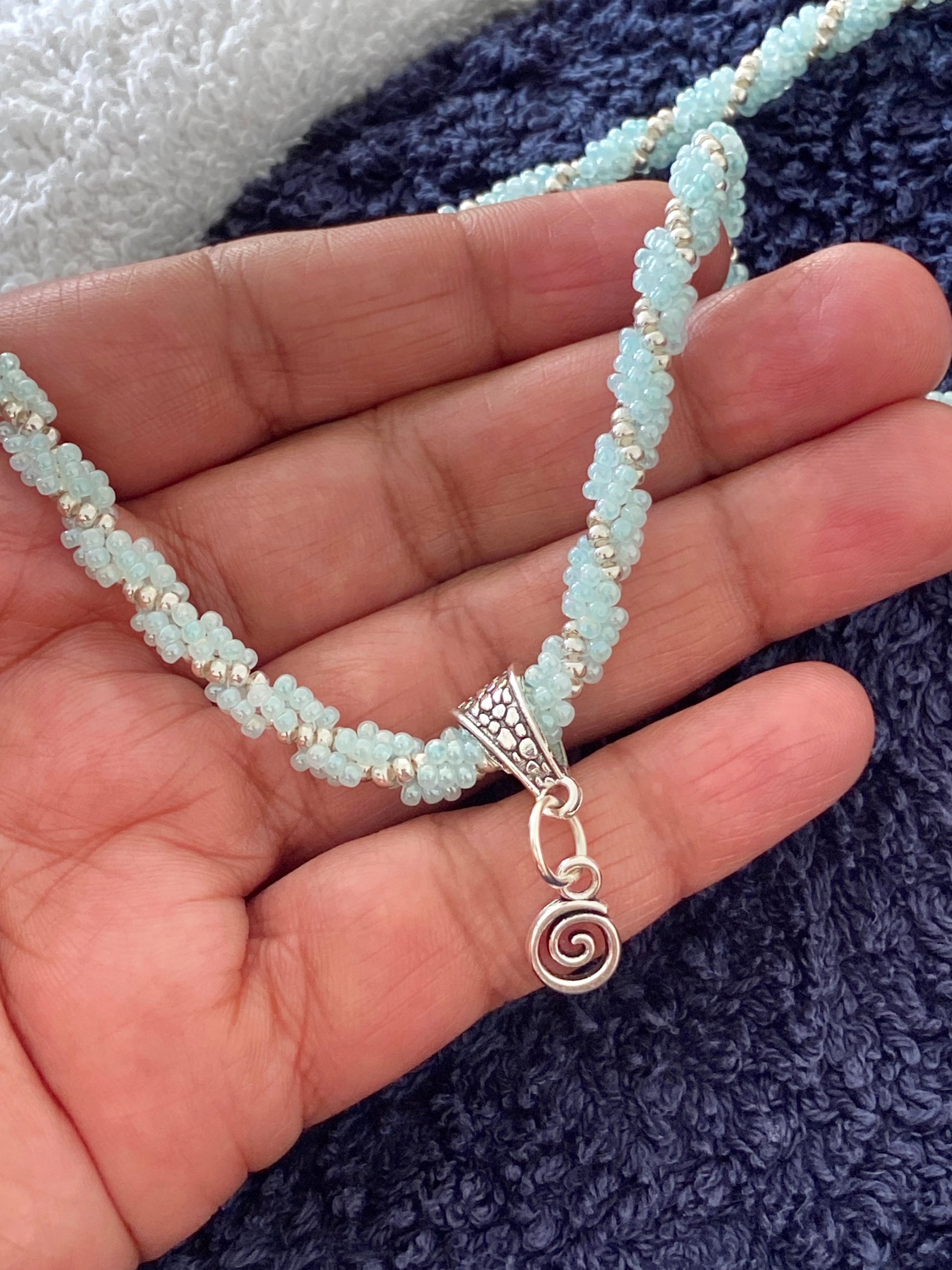 handmade beaded rope necklace with a mini spiral pendant. made by creativefusionsfashion