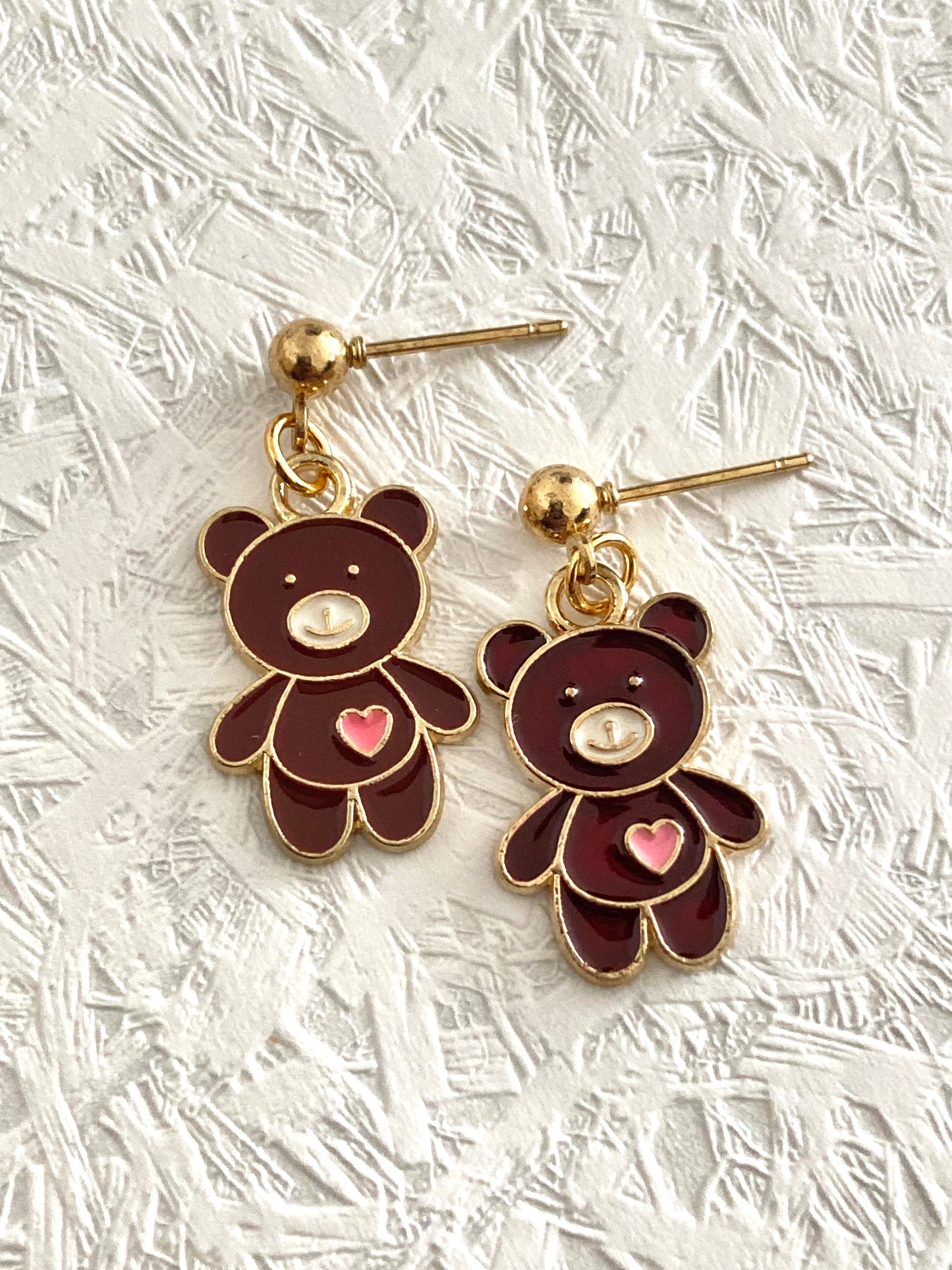 Drop earrings with meadow animal charms.