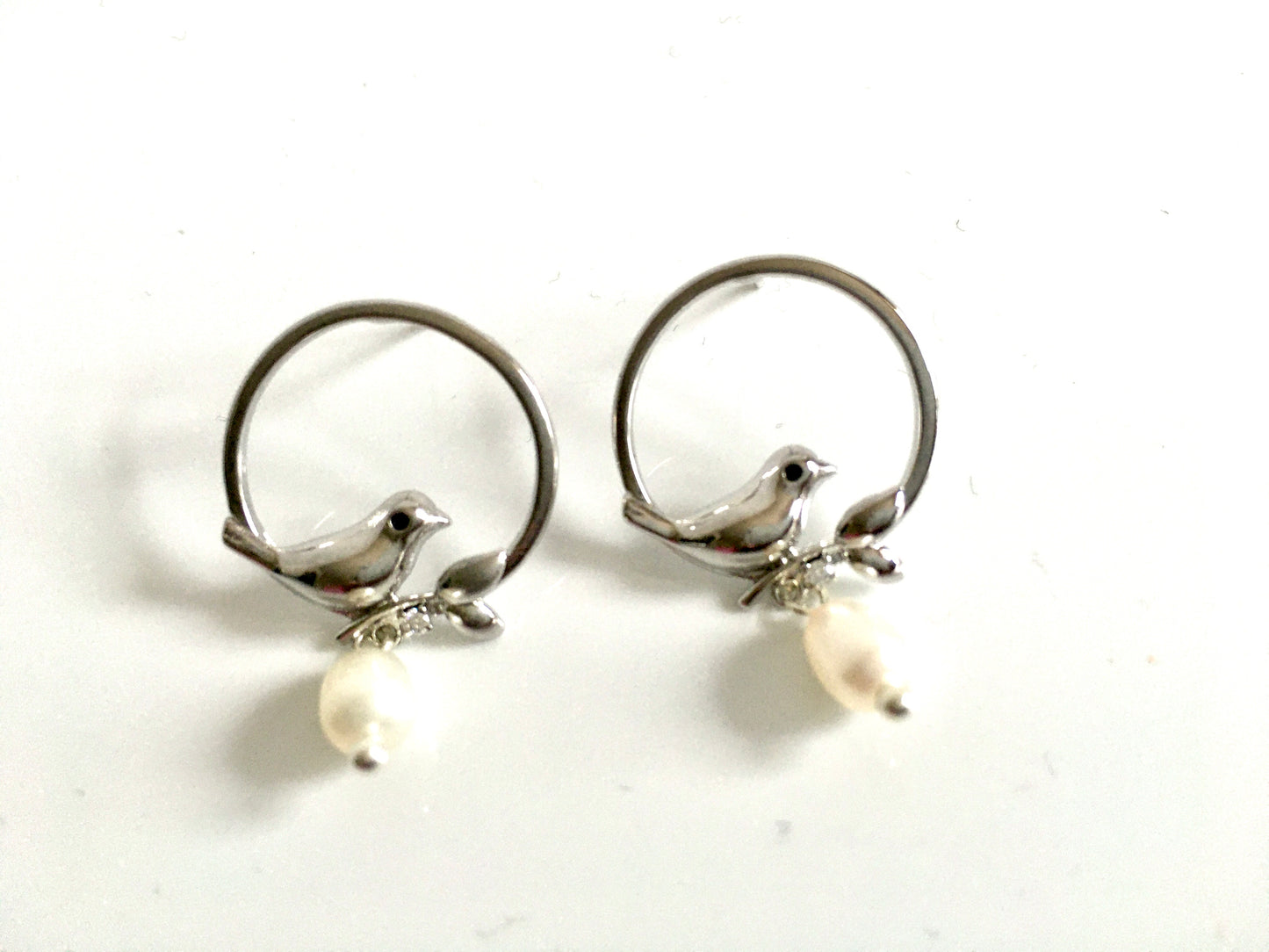 Silver sparrow earring